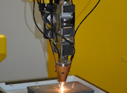 Петрозаводскмаш ввел в эксплуатацию лазерный роботизированный наплавочный комплекс
